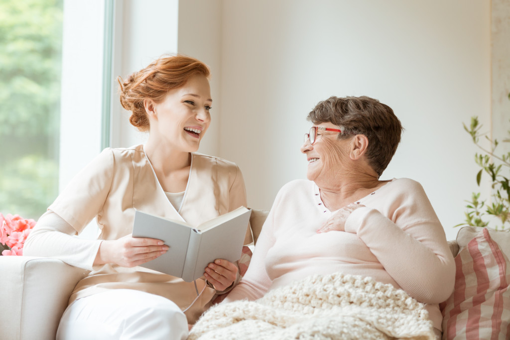 a caregiver and elderly woman