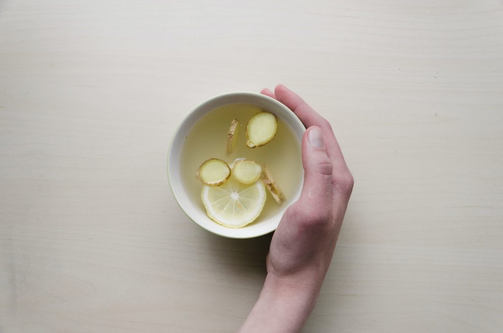 warm-lemon-drink- in-cup