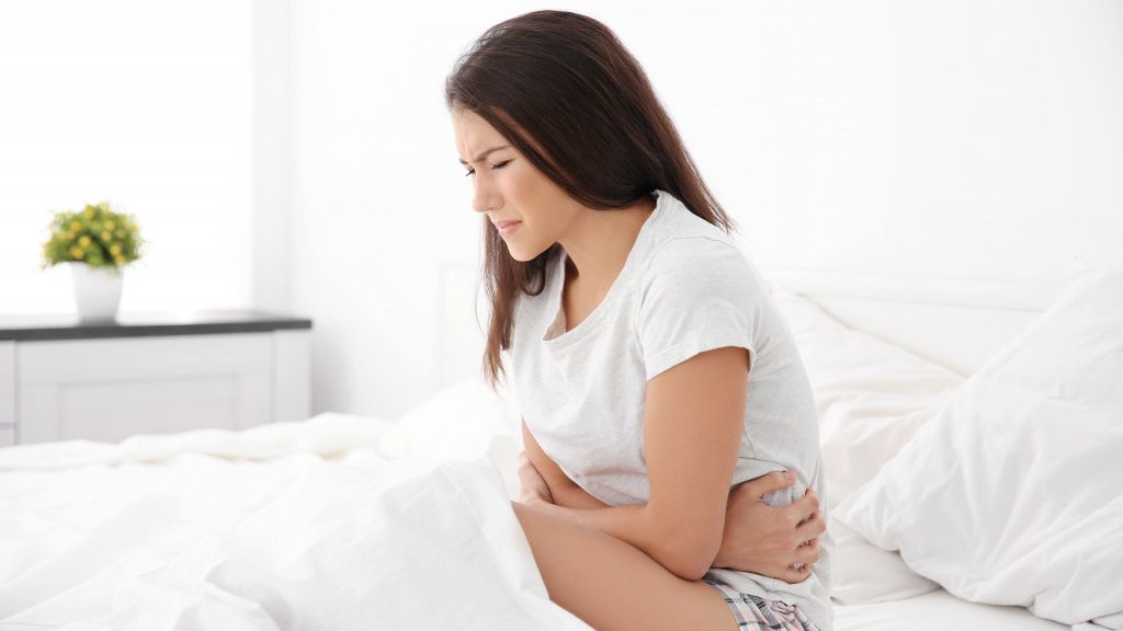 woman having stomach ache