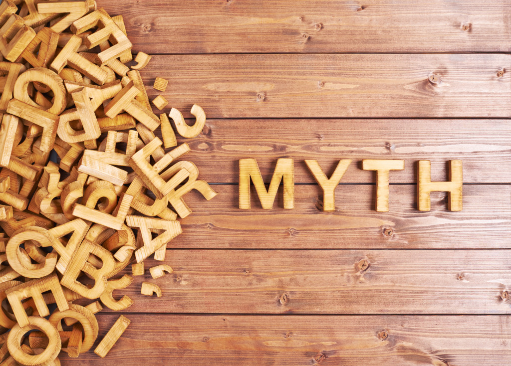 word myth made with block wooden letters