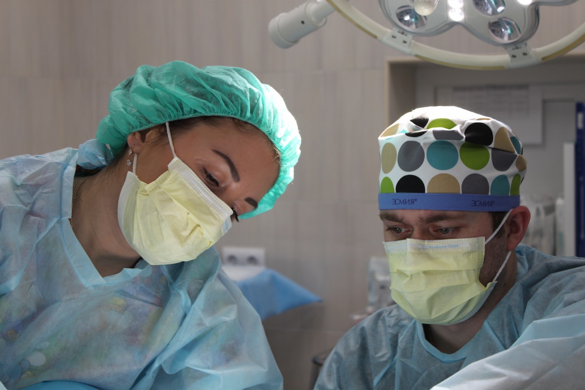 doctors doing a surgery